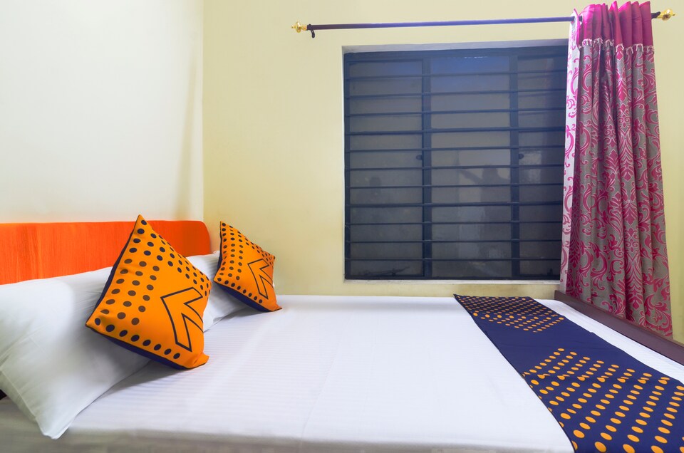 SPOT ON 68399 Trinity Lodge, Thampanoor Trivandrum, Trivandrum