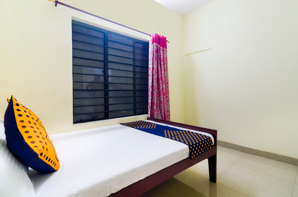 SPOT ON 68399 Trinity Lodge, Thampanoor Trivandrum, Trivandrum
